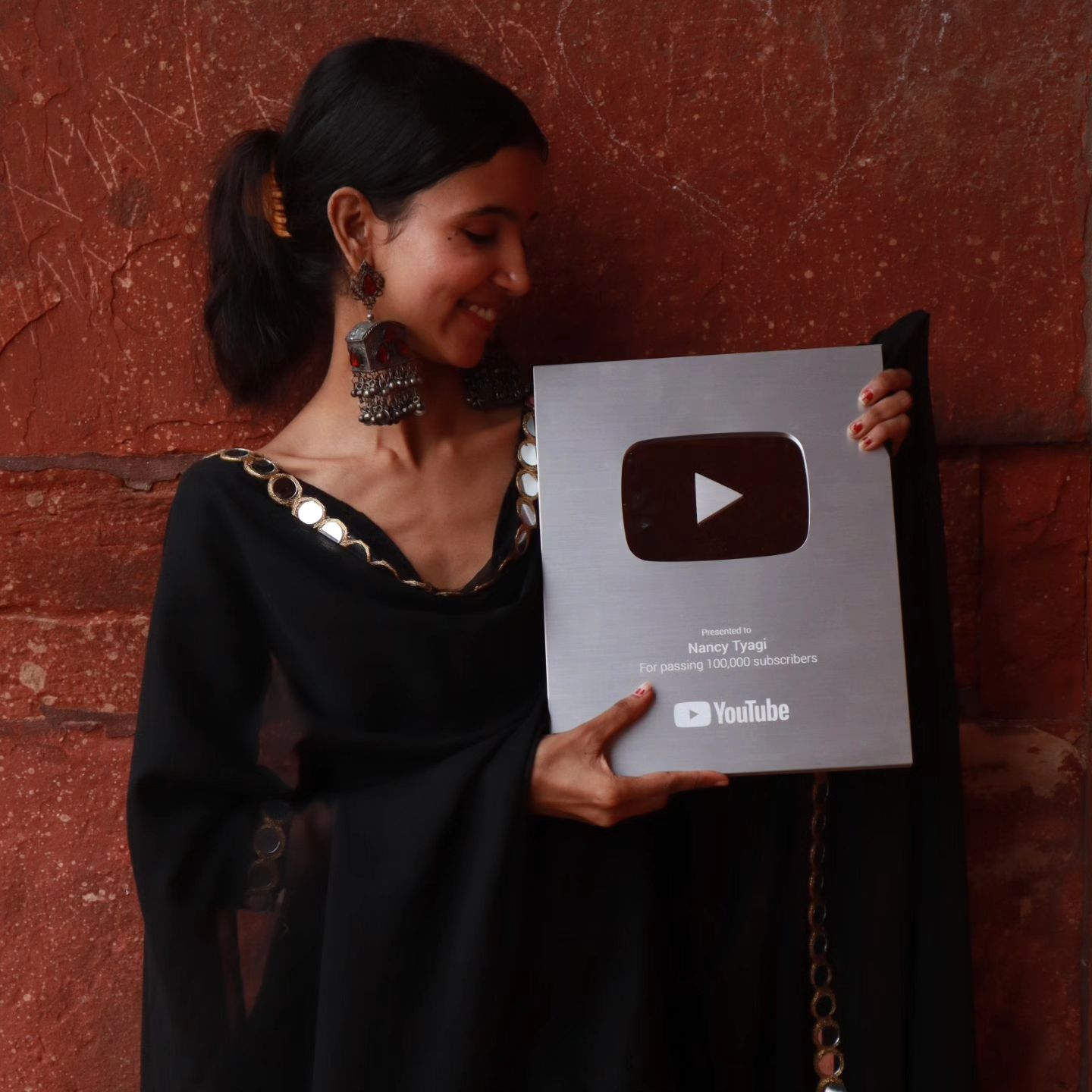 nancy with Silver Play button from Youtube